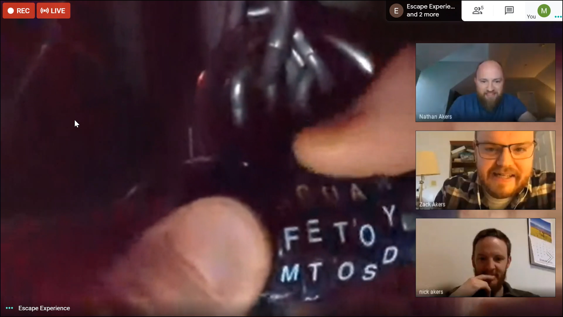 Google Meet view showing wordlock puzzle